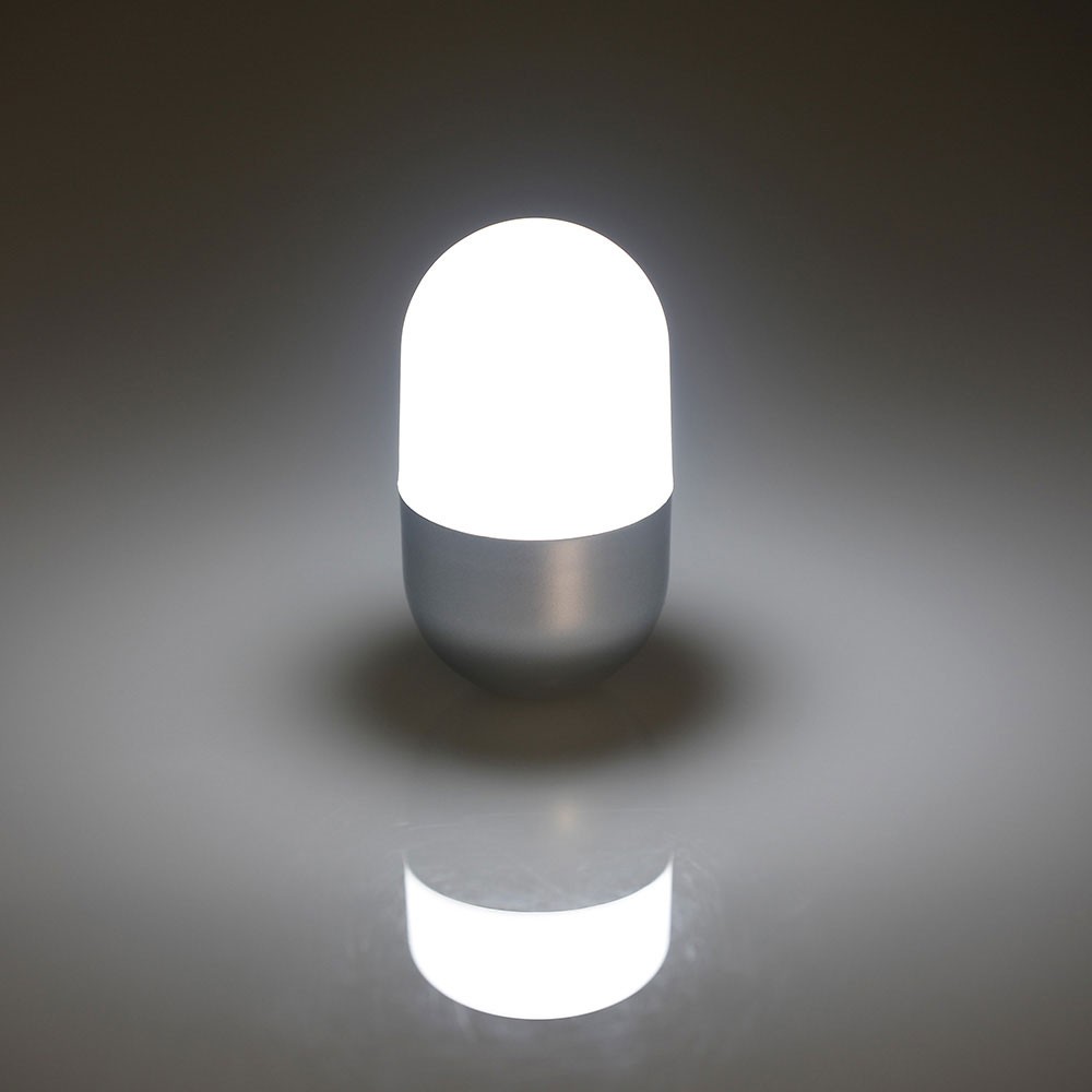 CAPSULE. Flashlight